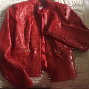 GENUINE red leather jacket. Pairs well with cowboy boots, DONT MISS OUT ON THIS!